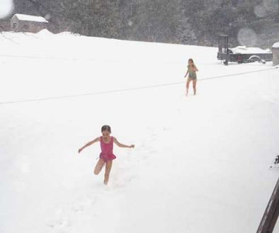 Running around the house in the snow!